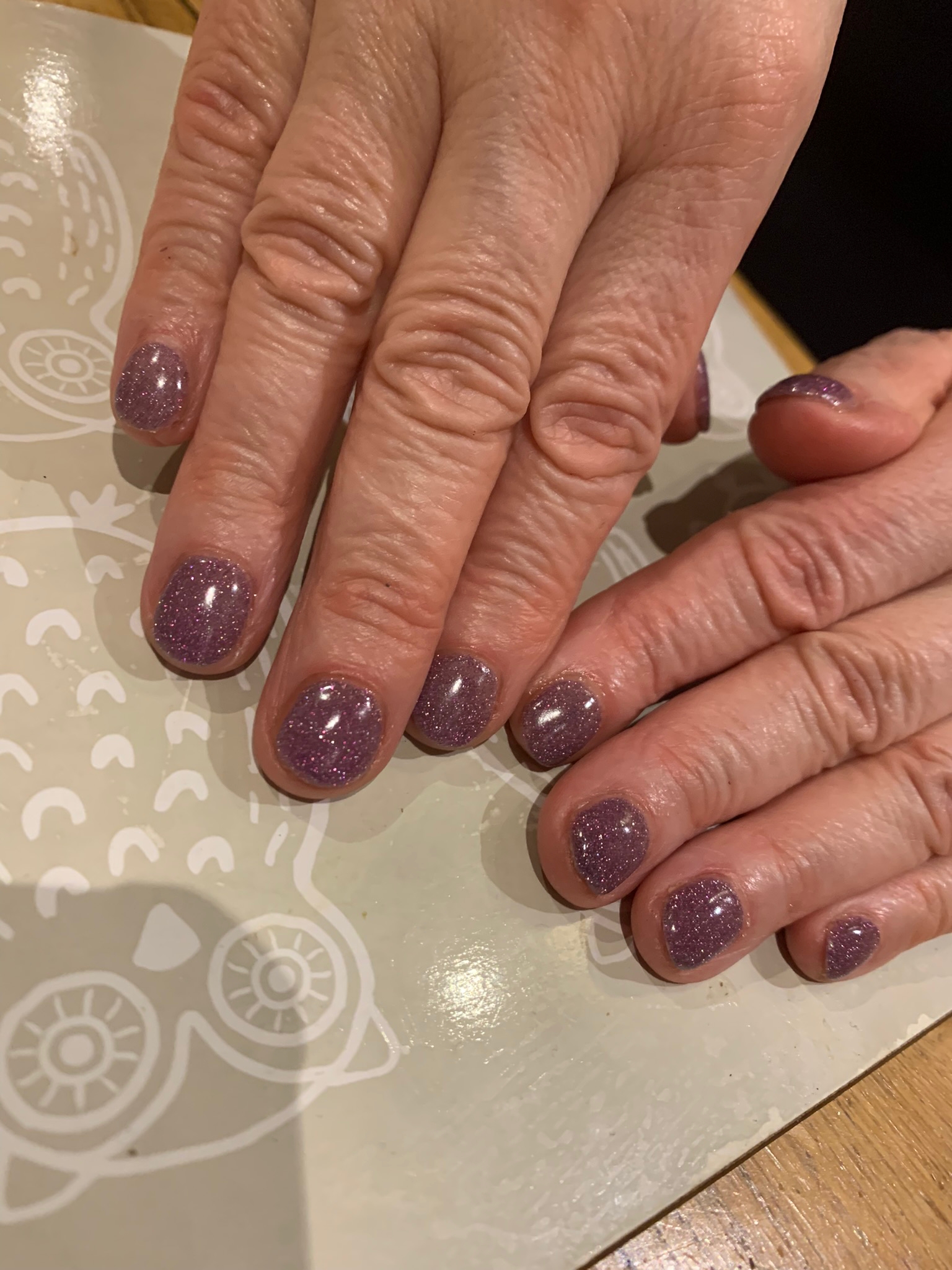 Happy 2023 Purple sparkles for my lovely client Kerry nails by natalie rose mobile manicure and pedicure london